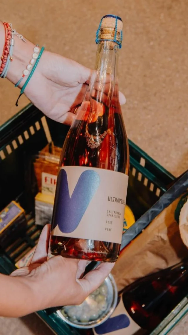 Come with us to get the essentials. 🥂🍅🫒

A chilled bottle of Ultraviolet Sparkling Rosé, good cheese, salty snacks, tomatoes that are almost too pretty to eat, and a baguette that barely fits in the cart.

We love seeing @ultravioletwines Sparkling Rosé in the chilled wine section @wholefoods. That means one less step between us and the perfect picnic.☀️

What’s your favorite snack pairing?

#winelovescompany #alwaysingoodco